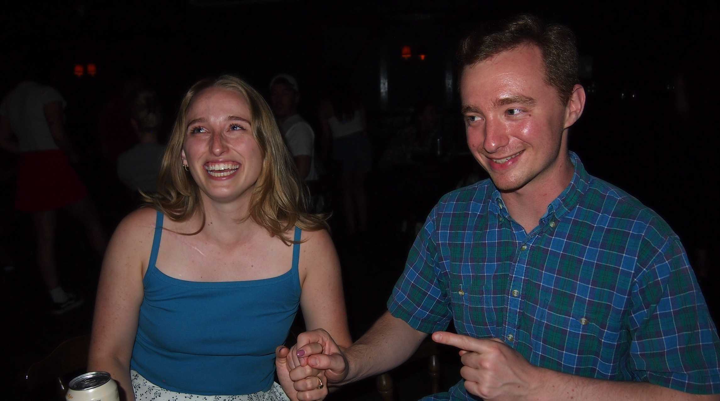 Happy couple holding hands